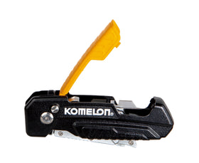 Komelon quick-release button releases blade safely