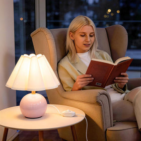 Komothala lamp includes an E26 LED bulb for quick setup.