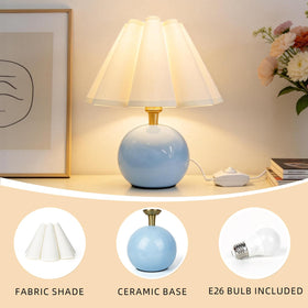 Stylish bedside lamp setup enhances nightstand decor with warm light.
