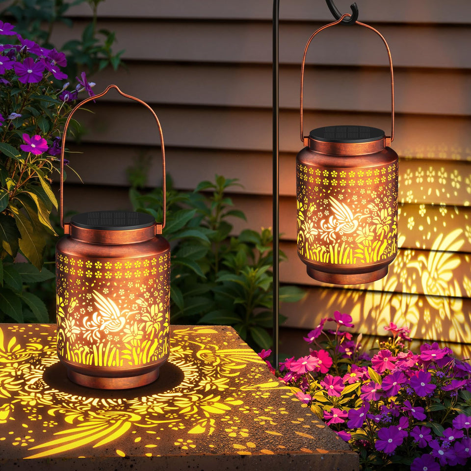 KOOPER solar lantern with hummingbird pattern for stunning garden lighting.