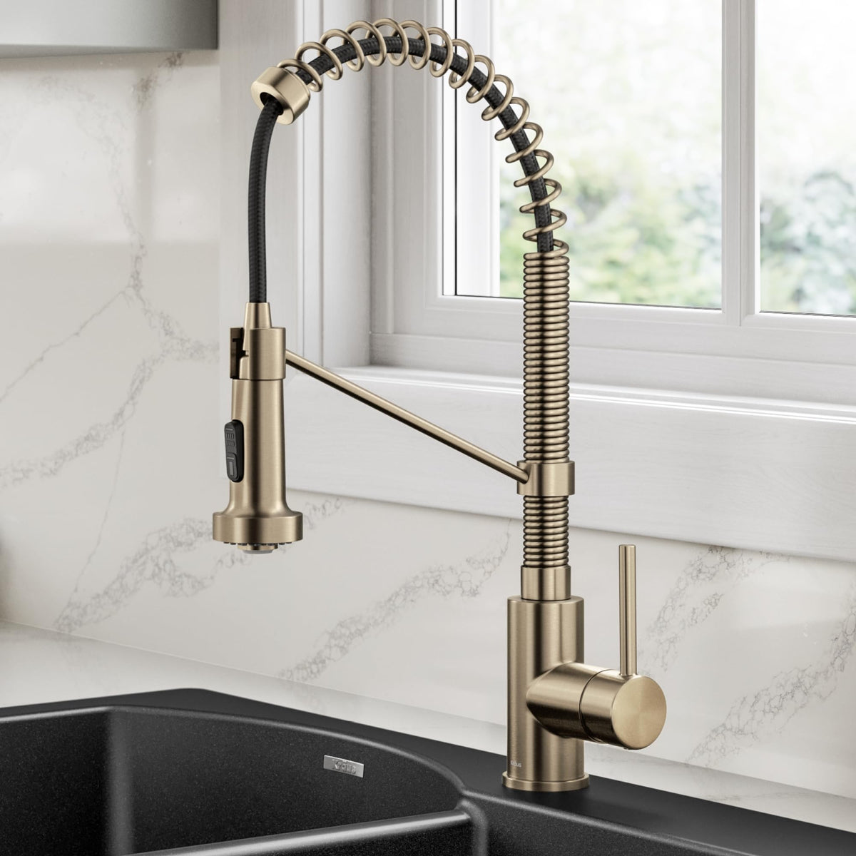 Kraus Bolden pull-down sprayer extended reach demonstrates full sink maneuverability.
