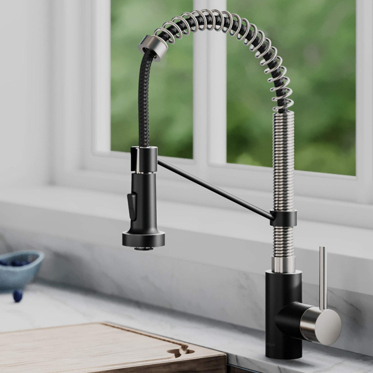 Kraus Bolden pull-down sprayer enables versatile washing tasks.