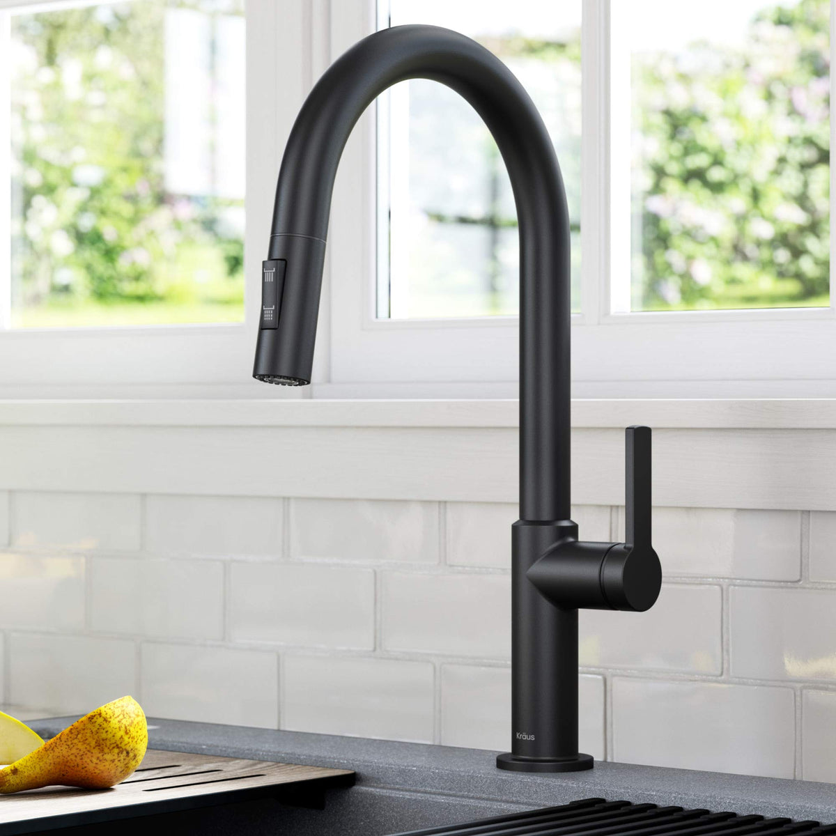 Kraus Oletto matte black faucet side angle showcases compact footprint and sleek profile.