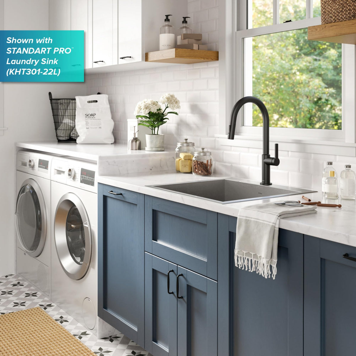 Kraus Oletto pull-down action image captures flexible reach during tasks.