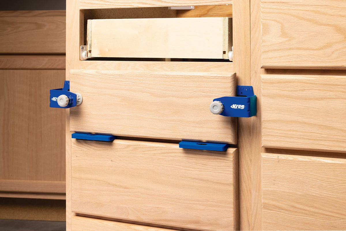 Kreg Drawer Front Mounting Pro Kit alignment clamp helps precise positioning.