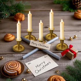 KSWING ivory 6-inch flickering LED taper candle on mantel