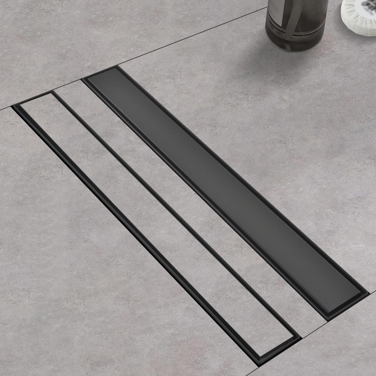 Kuaisailsk linear drain in black with 24-inch frame for bathroom floors