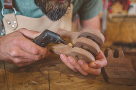 Kutzall burrs installed in a rotary tool for wood shaping.