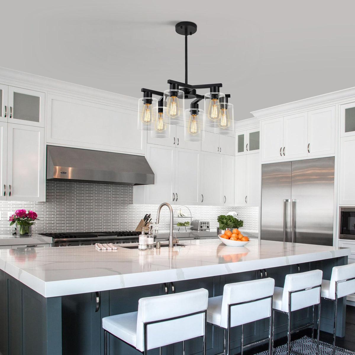 Kvaeavn clear glass shades diffuse light into a soft veil across space.