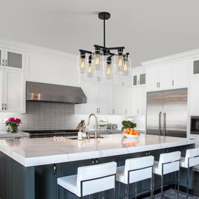 Kvaeavn clear glass shades diffuse light into a soft veil across space.