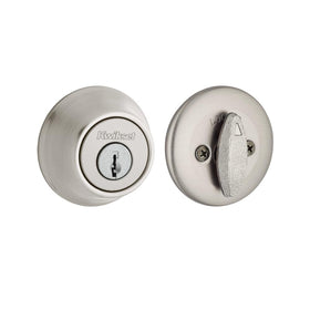 Kwikset 660 deadbolt exterior keyed entry on a front door for secure access.