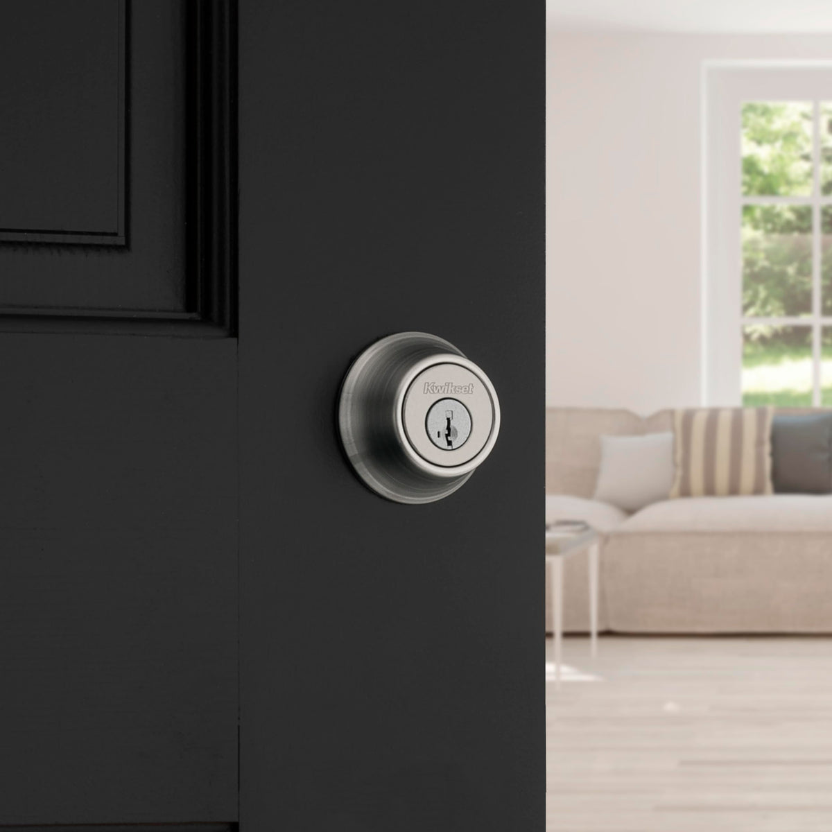 Kwikset 660 satin nickel finish enhances curb appeal and durability.