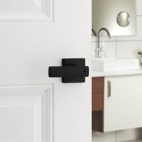 Kwikset Breton privacy lever on door showing turn-lock access.