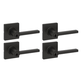Kwikset Casey front-view lever in matte black shown on a modern exterior door for enhanced curb appeal