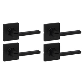 Kwikset Casey interior passage handle 4-pack installed on a modern interior door for closets
