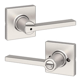 Kwikset Casey interior privacy handle on bedroom door for secure privacy.