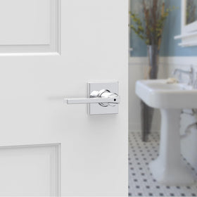 Kwikset Casey door lever installed on standard door showing reversible handedness.