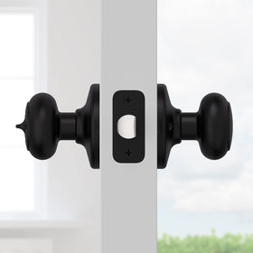 Kwikset Cove matte black finish close-up on privacy door knob