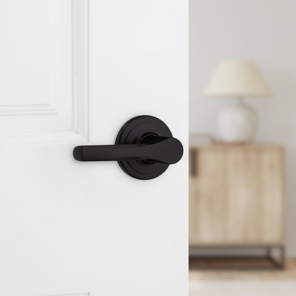 Kwikset Henley lever on door showing reversible design for both sides