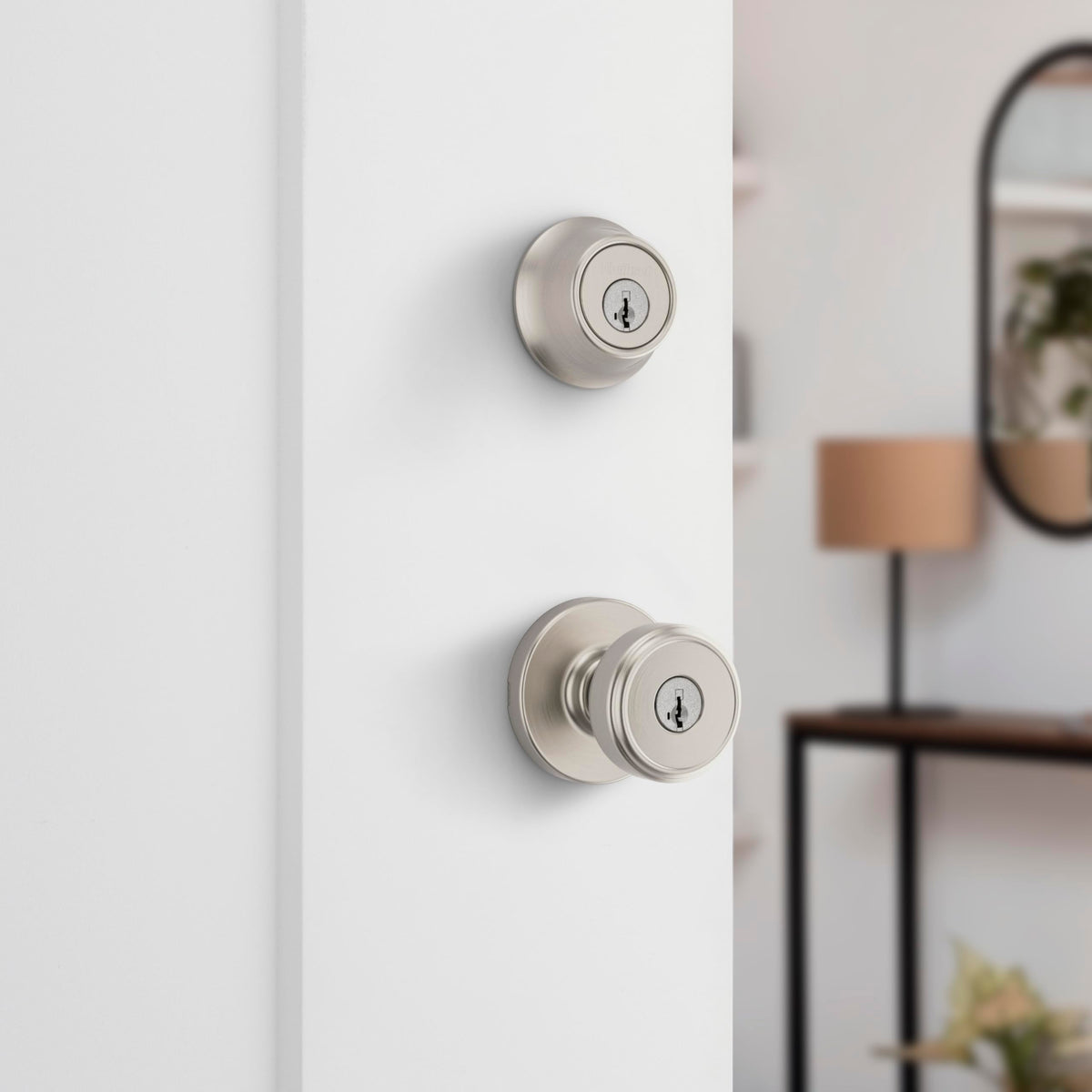 Kwikset Maven entry handleset round exterior showing modern hardware