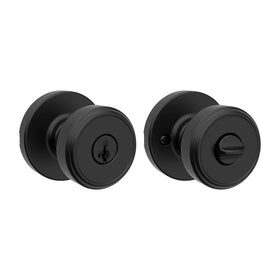 Kwikset Maven keyed entry knob on an exterior door for secure access.