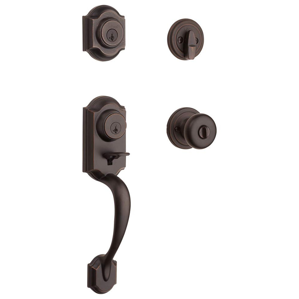 Kwikset Montara front door handle set in Venetian Bronze for secure exterior entry.