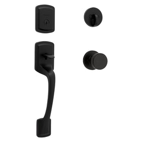 Kwikset Prague handleset on exterior door with modern matte black finish for curb appeal and security