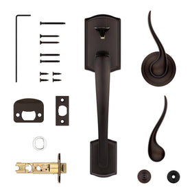 Kwikset Prescott strike plate in Venetian Bronze complements traditional design