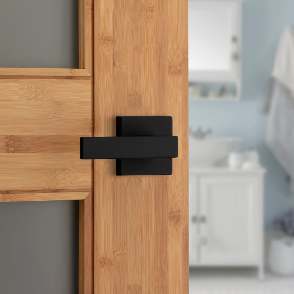 Never-sag Kwikset Singapore lever provides stable operation on matte black finish.