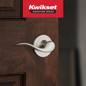 Kwikset Tustin interior passage lever installed on a standard door