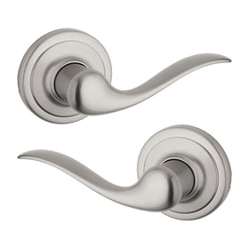 Kwikset Tustin satin nickel lever close-up showing smooth operation for daily use