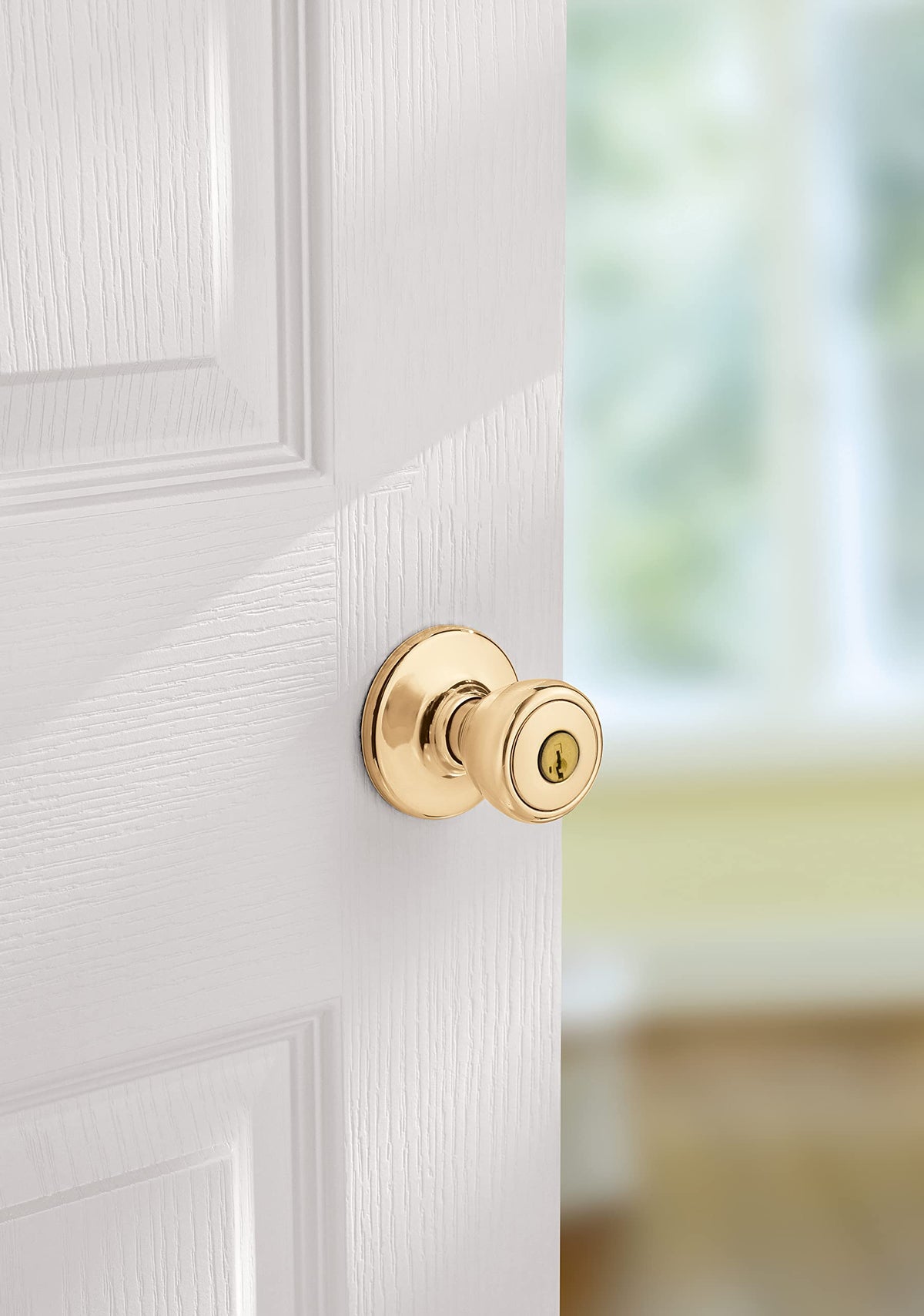 Kwikset Tylo smartkey security rekey feature demonstrated on a door knob