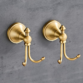 KWQKEM antique brass towel hook with double hooks for wall mounting, maximizing bathroom organization.