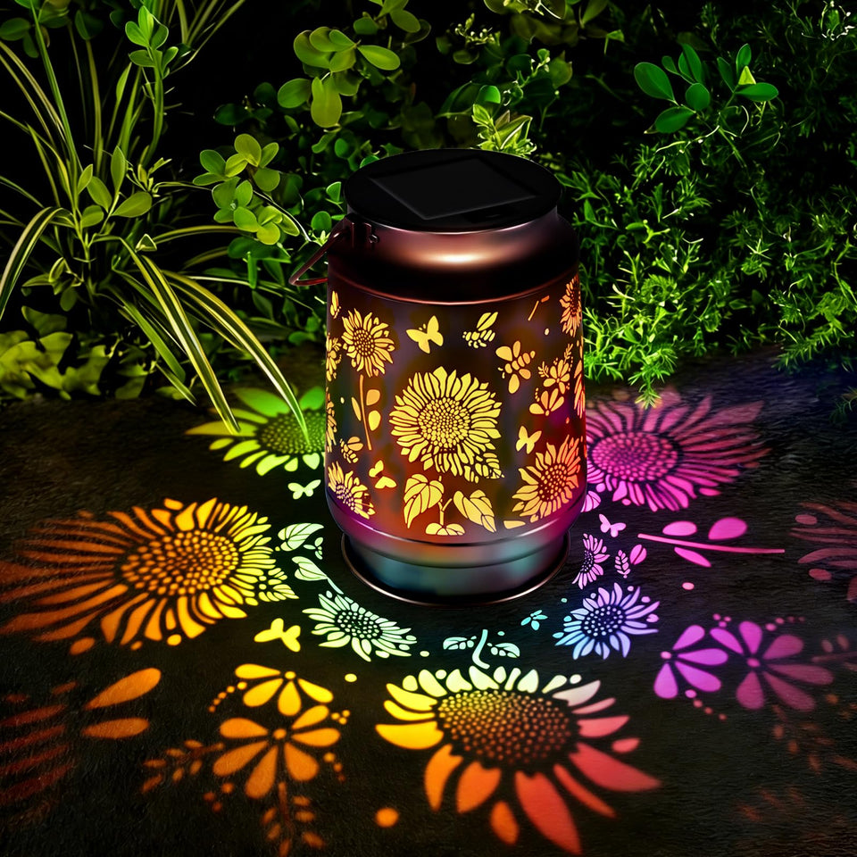 Kyoryuger solar lantern with sunflower pattern casting warm garden light at dusk
