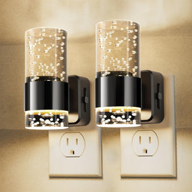 L LOHAS LED two-pack night light plugged into a wall for safe hallway illumination