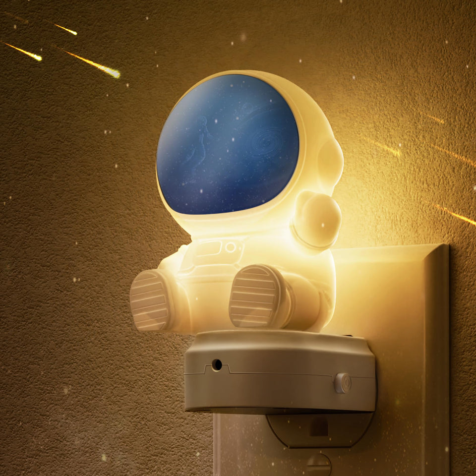 L LOHAS LED spaceman night light adds a playful bedtime glow.