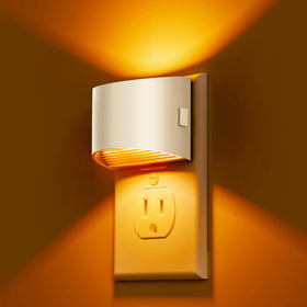 L LOHAS LED night light 2-pack illuminates walls with amber 1600K glow for safe steps.