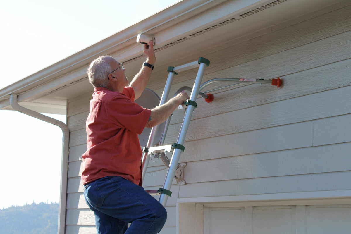 Ladder-Max improves access for window washing and roof repairs.