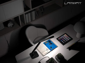 Lampat built-in USB port charges devices right at the desk.