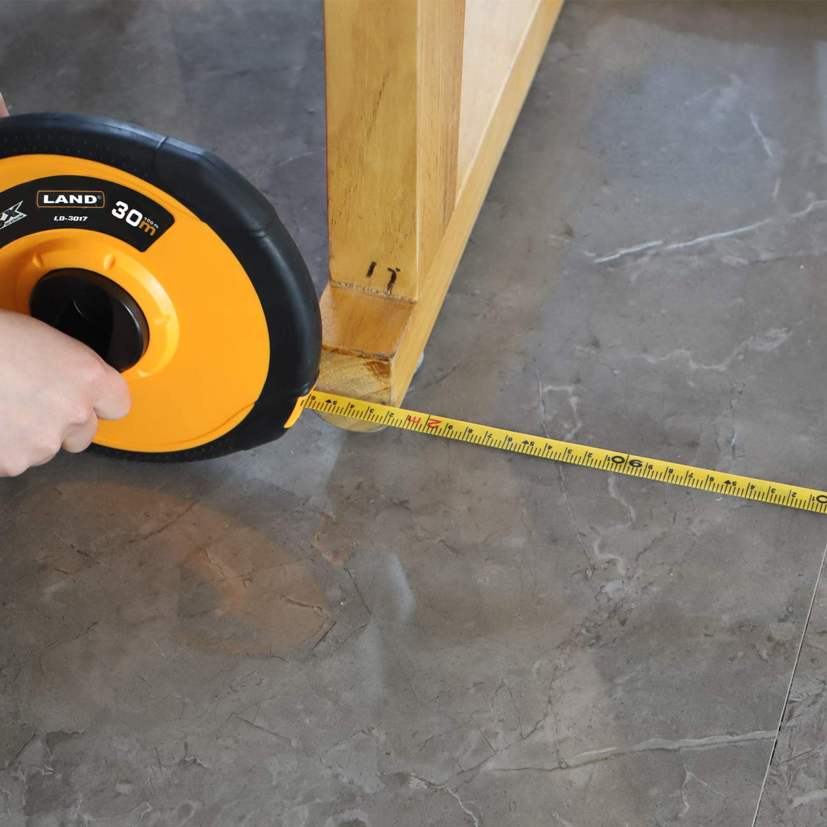 LAND durable measuring tool suitable for construction, surveying, and landscaping projects.