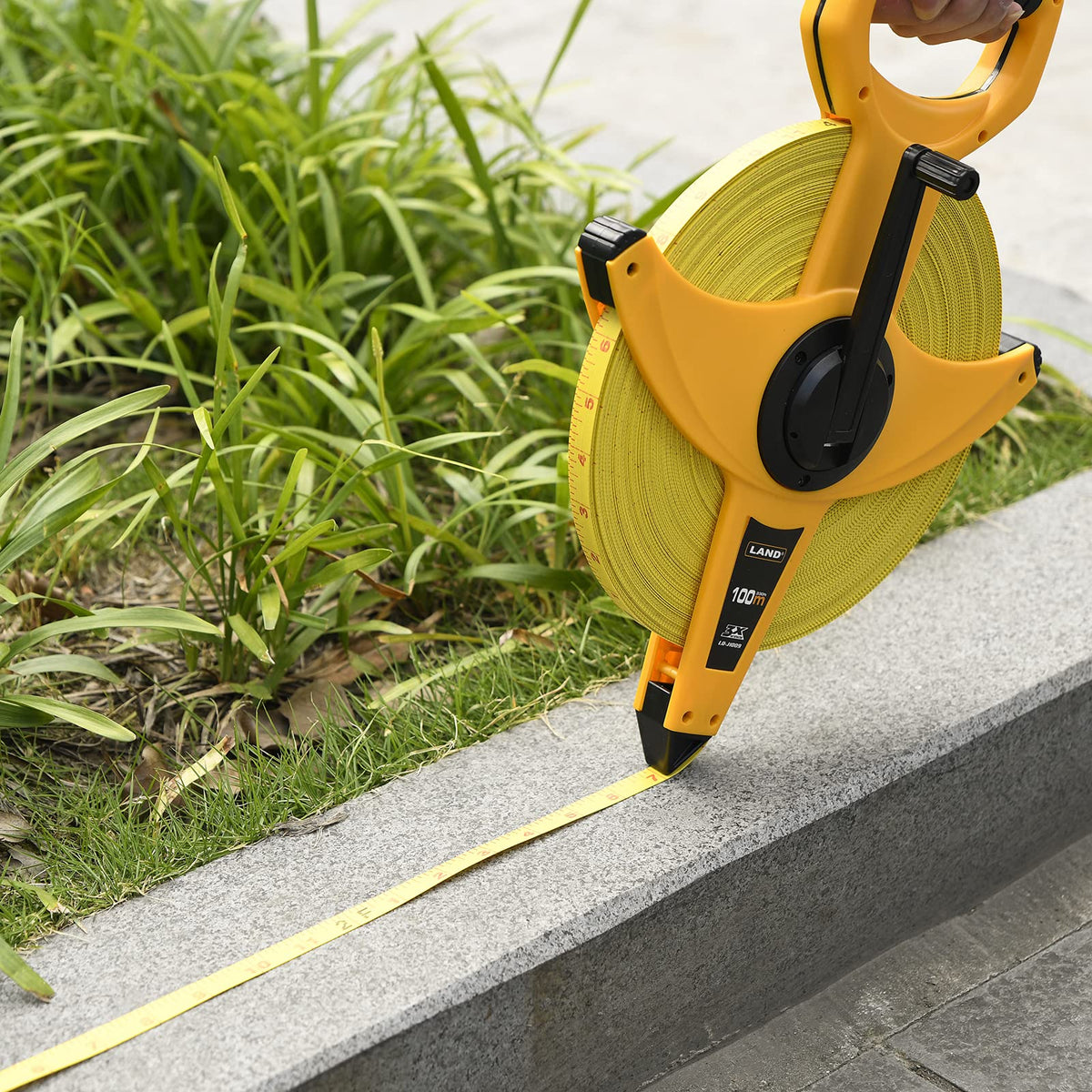 LAND heavy-duty fiberglass tape case suitable for engineering and runway construction.