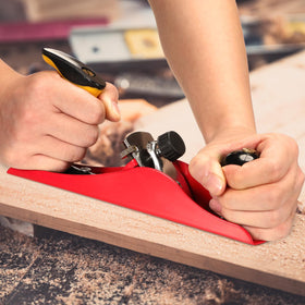 Depth adjustment dial on Lanties planer for precise shaving