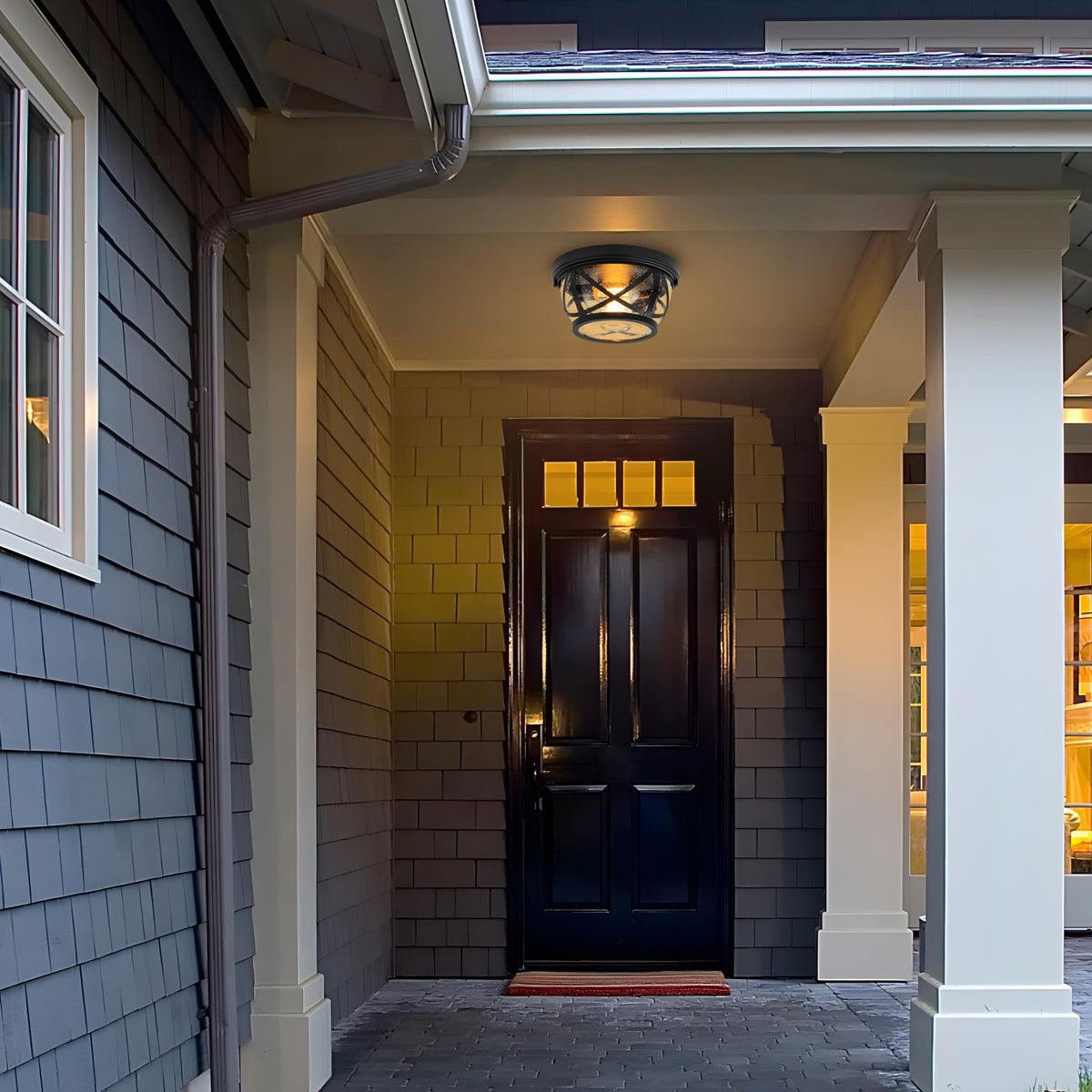 Laplusbelle two-light fixture in black with seeded glass for brighter hallway lighting.