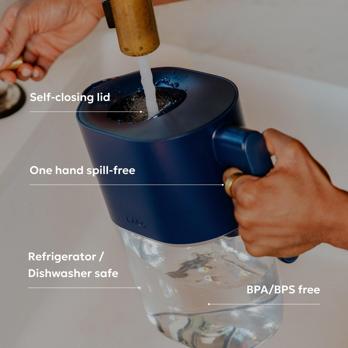 LARQ pitcher 1.9L capacity on kitchen counter for family hydration.