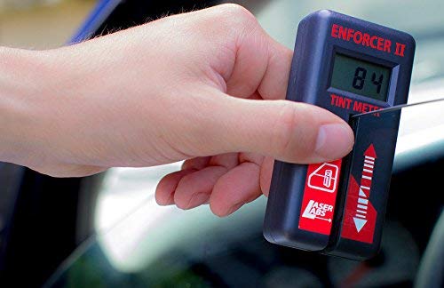 Laser Labs Enforcer II Tint Meter in use demonstrates fast, consistent tint measurements for compliance checks.