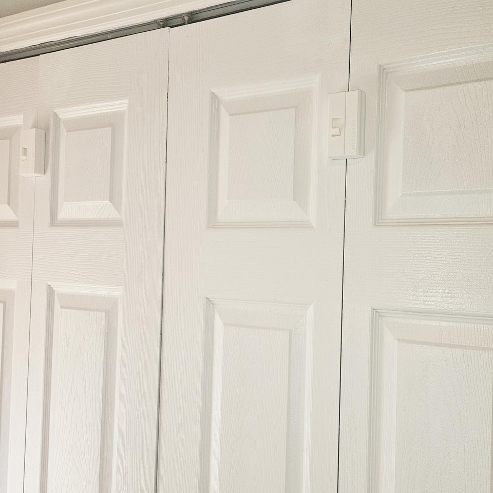 LatchSmart Bifold Lock 2-pack front view; secure fit keeps kids out of closets.