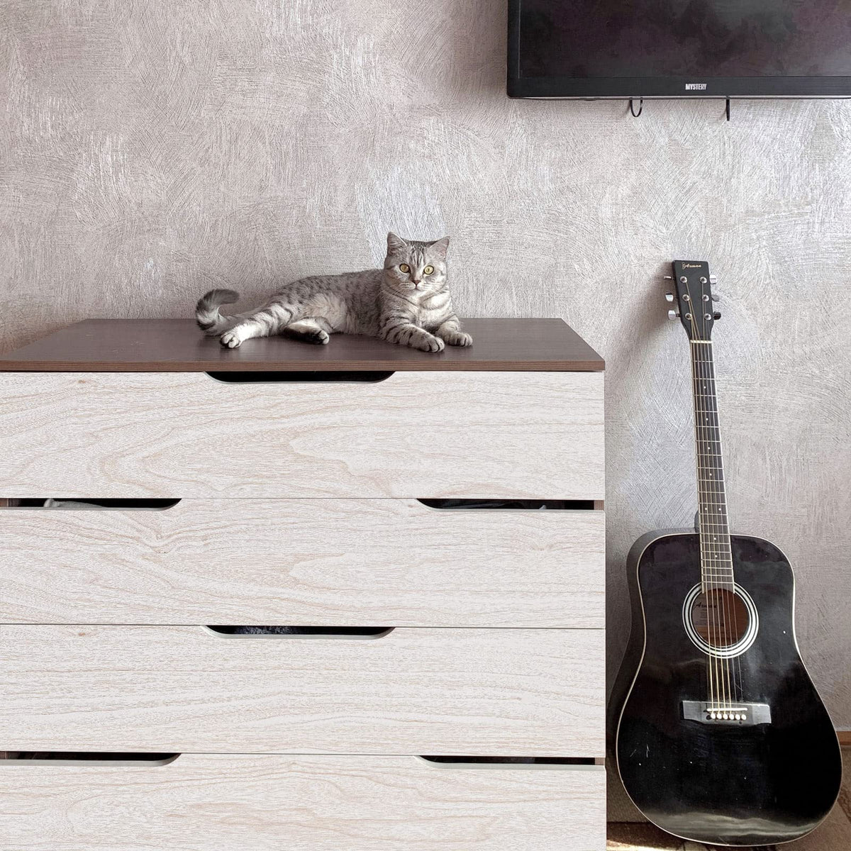 Lativo wood grain peel and stick wallpaper adds quick, affordable texture to furniture.