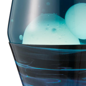 Lava Original lamp aluminum base and cap provide sturdy support