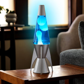 Lava The Original Lamp glowing softly in a dim room for cozy mood lighting.