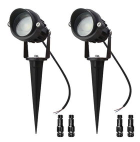 LAVAED wall wash spotlight delivering warm 3000K illumination along a modern exterior wall.